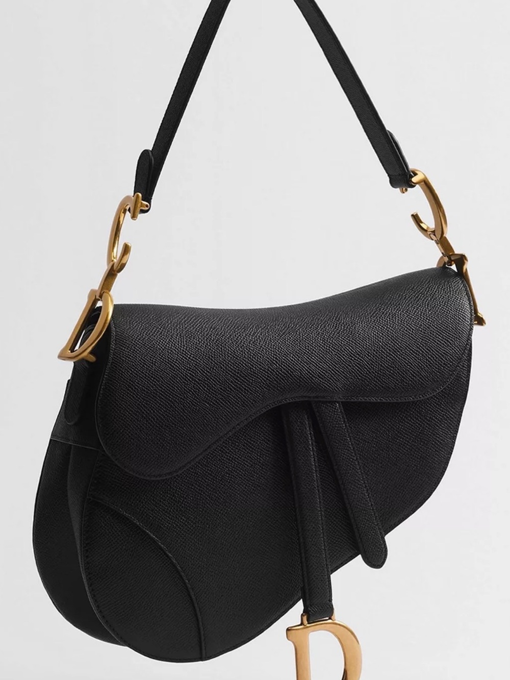Black Saddle-Style Shoulder Bag with Gold Hardware